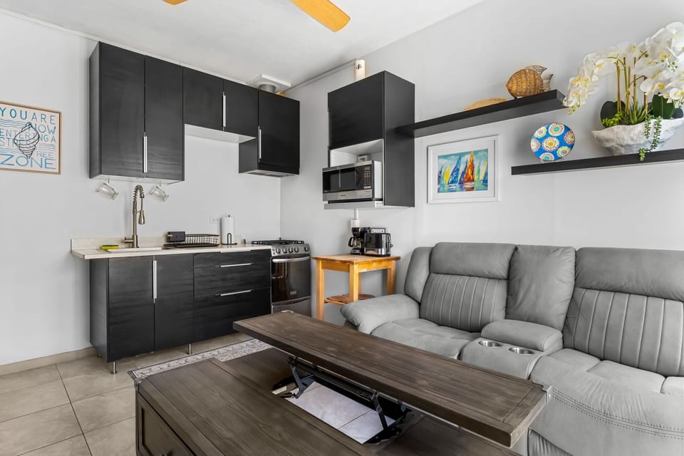 Open living area steps from a fully equipped kitchen