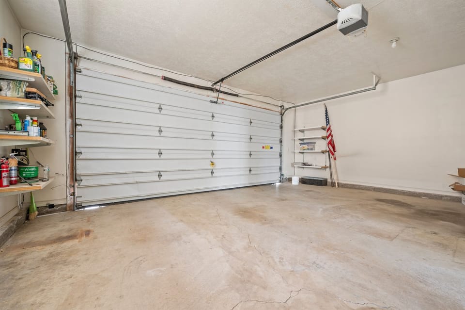 Two-car garage with room for ski gear, bikes, and easy parking.