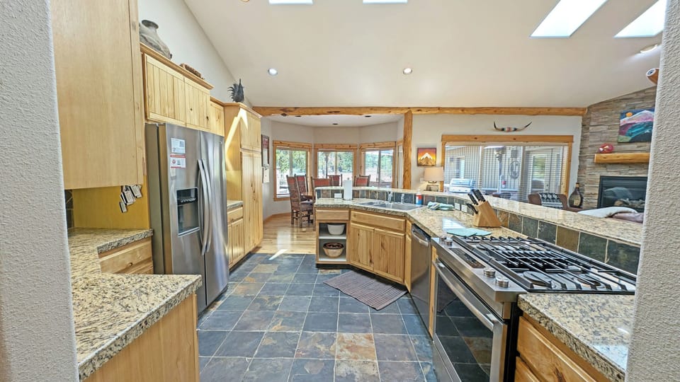 The kitchen is full of beautiful stainless steel appliances
