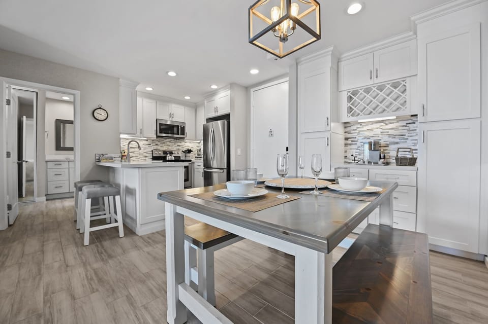 Enjoy two additional seating by the island
Kitchen island features two built‑in bar‑stools for added convenience