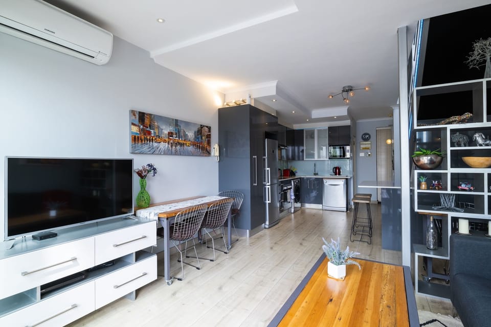 Classic Apartment, City View | Living area | 55-inch plasma TV with satellite channels, streaming services