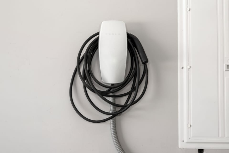 A sleek electric vehicle charging station awaits your eco-friendly travels, perfectly positioned for convenient access.