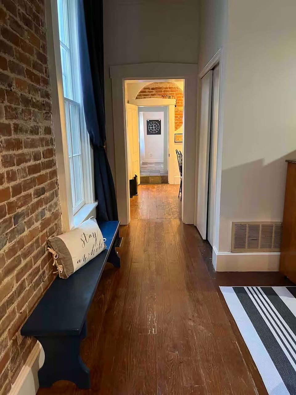 Open doorway from bunk bedroom to kitchen