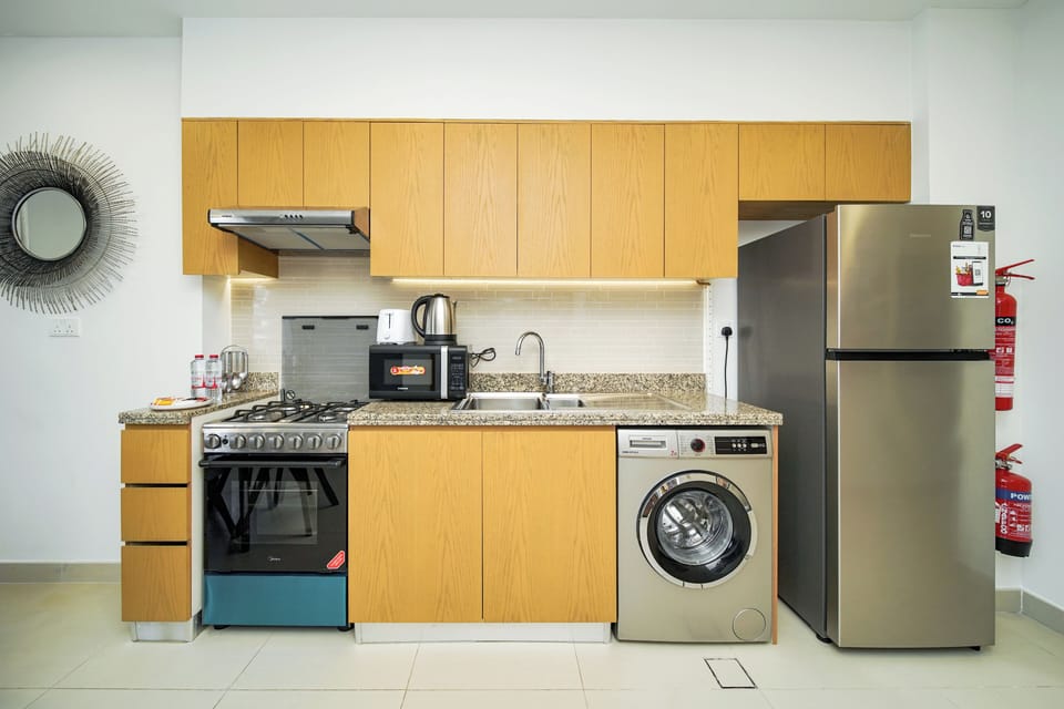 Exclusive Apartment, Balcony, City View | Private kitchenette | Full-size fridge, microwave, oven, stovetop