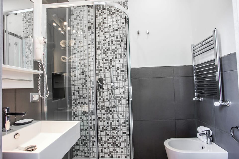 Classic Townhome, 1 Queen Bed, Balcony | Bathroom | Shower, hair dryer, towels, soap