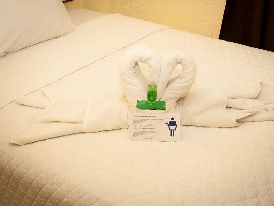 Feel welcomed with charming towel art and fresh, clean bedding.