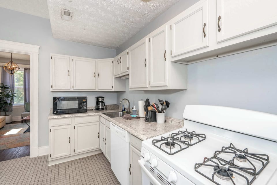 The breezy kitchen is well equipped for an unforgettable getaway​