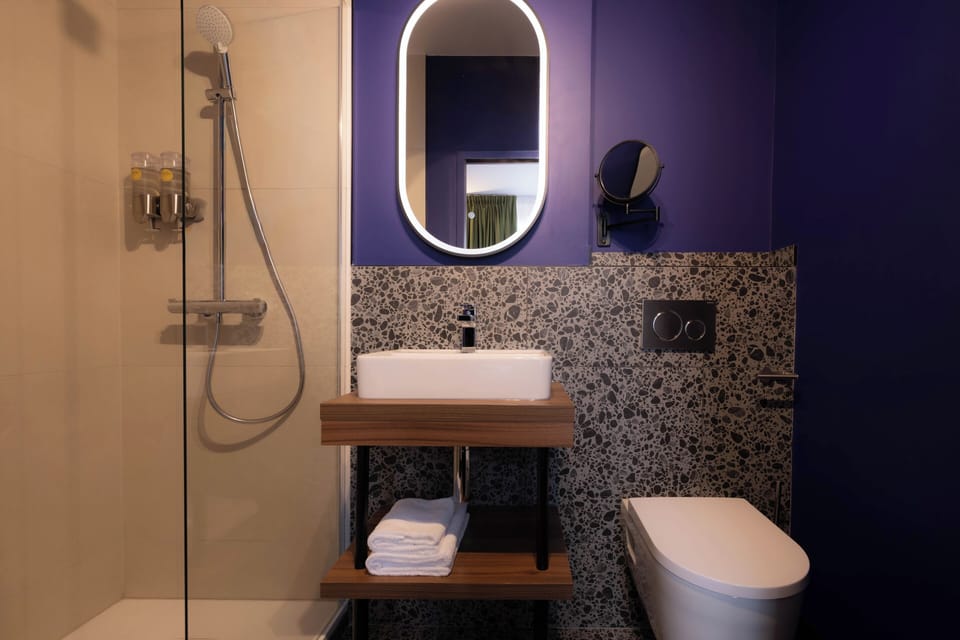 Hair dryer, towels, soap, shampoo