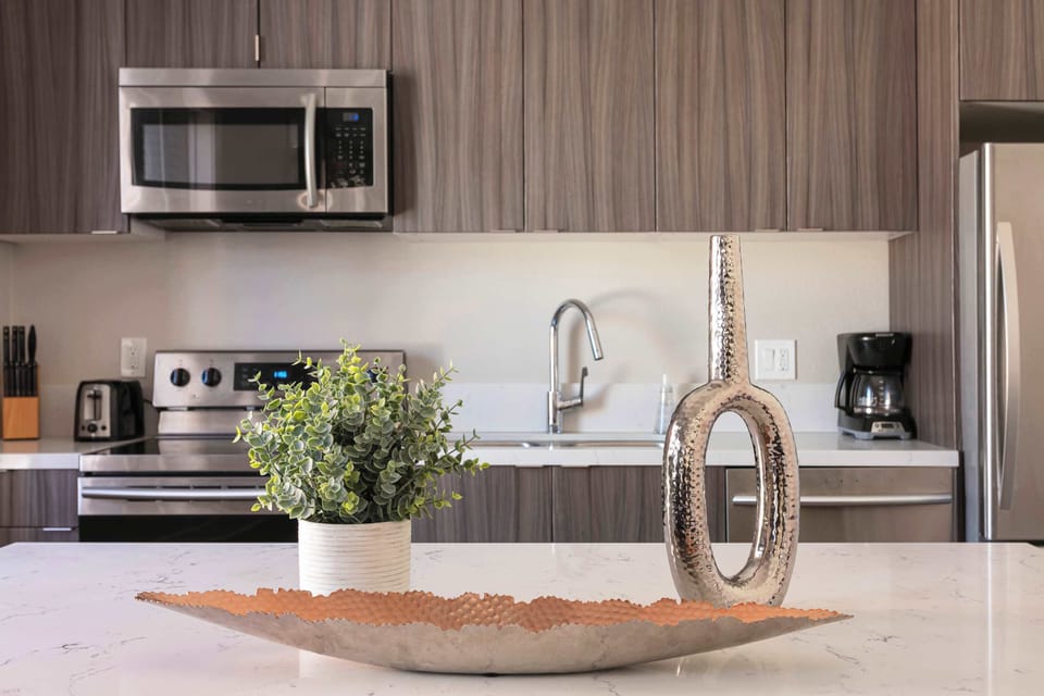 "Prepare meals with ease in our fully-equipped kitchen."