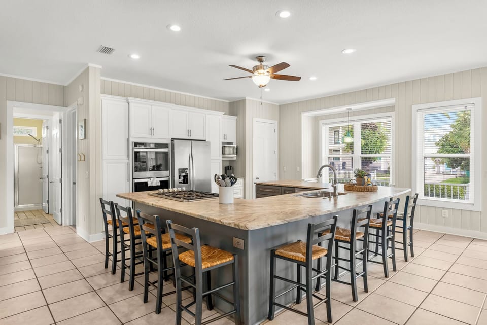 Wrap around kitchen island with seating for 12 