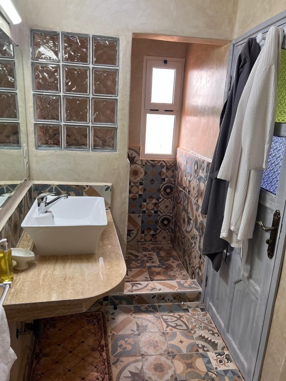Shower, free toiletries, towels, soap