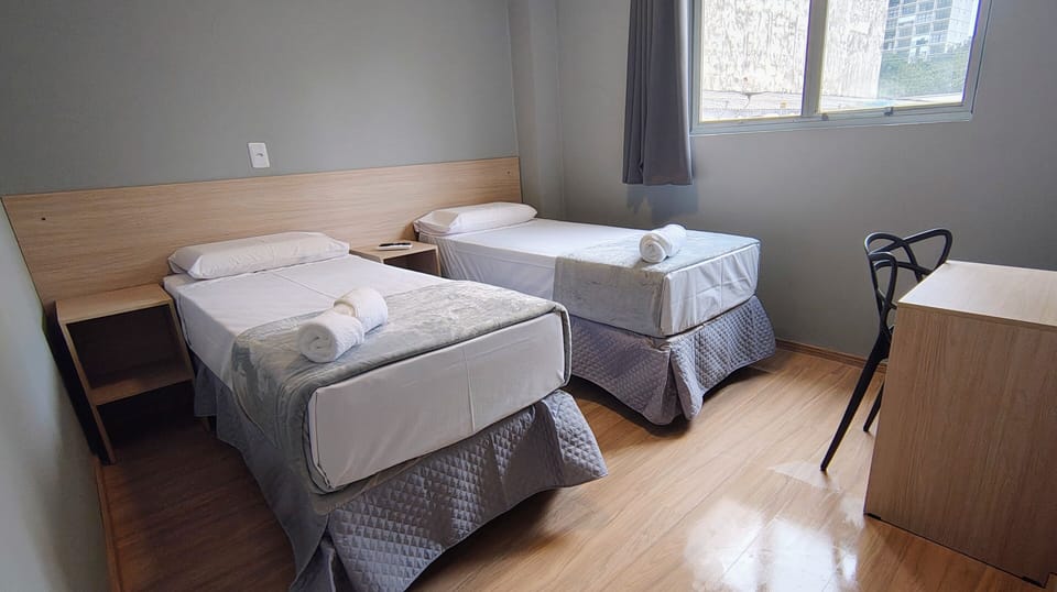 Standard Double or Twin Room | Laptop workspace, bed sheets