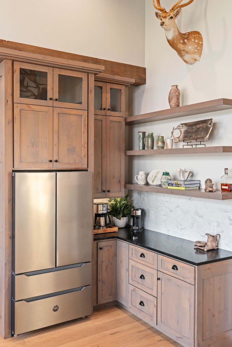 Tall ceilings, and antlers, can be found throughout the home.
