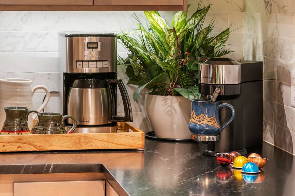 Fuel your mornings with Nespresso pods, drip coffee, or both - choose your style and sip in mountain comfort.