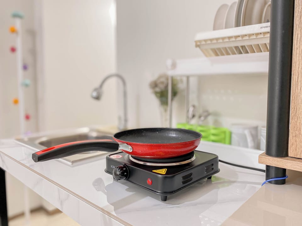 Apartment | Private kitchen | Fridge, stovetop, cookware/dishes/utensils