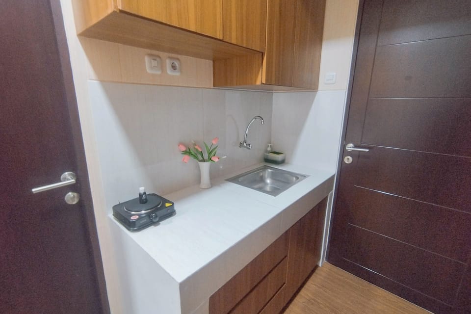 Apartment | Private kitchen | Fridge, stovetop, cookware/dishes/utensils