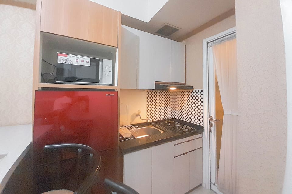 Apartment | Private kitchen | Fridge, stovetop, cookware/dishes/utensils