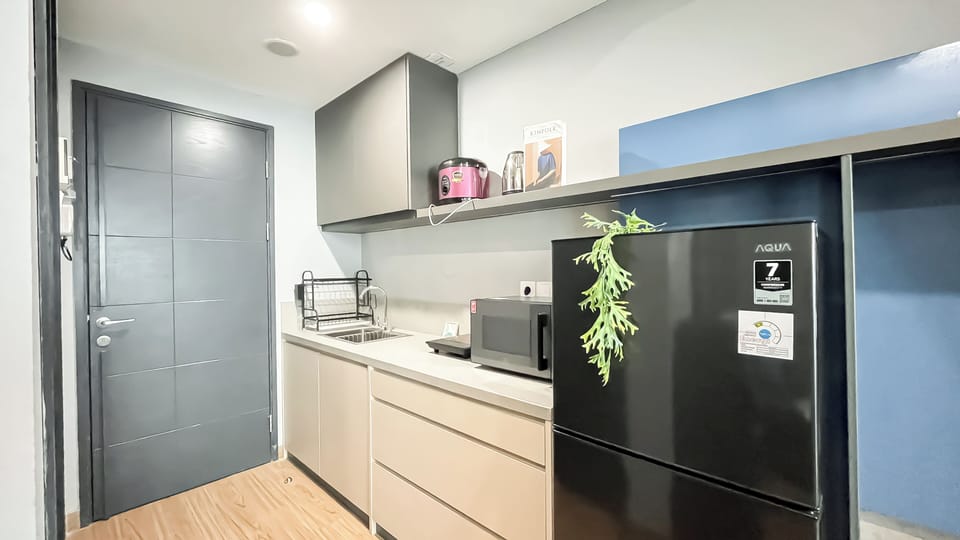 Apartment | Private kitchen | Fridge, stovetop, cookware/dishes/utensils