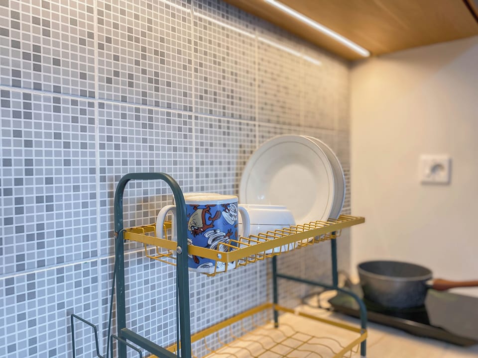 Apartment | Private kitchen | Fridge, stovetop, electric kettle, cookware/dishes/utensils