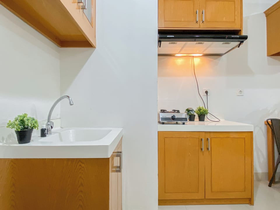Apartment | Private kitchen | Fridge, microwave, stovetop, cookware/dishes/utensils