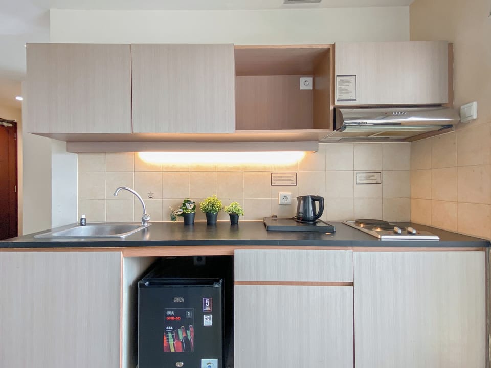 Apartment | Private kitchen | Fridge, stovetop, cookware/dishes/utensils