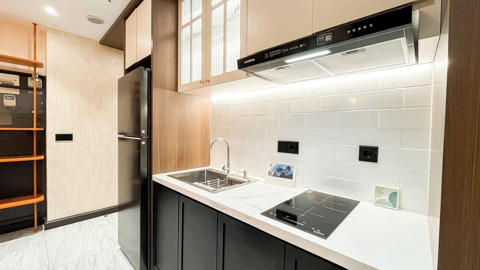 Apartment | Private kitchen | Fridge, microwave, stovetop, cookware/dishes/utensils