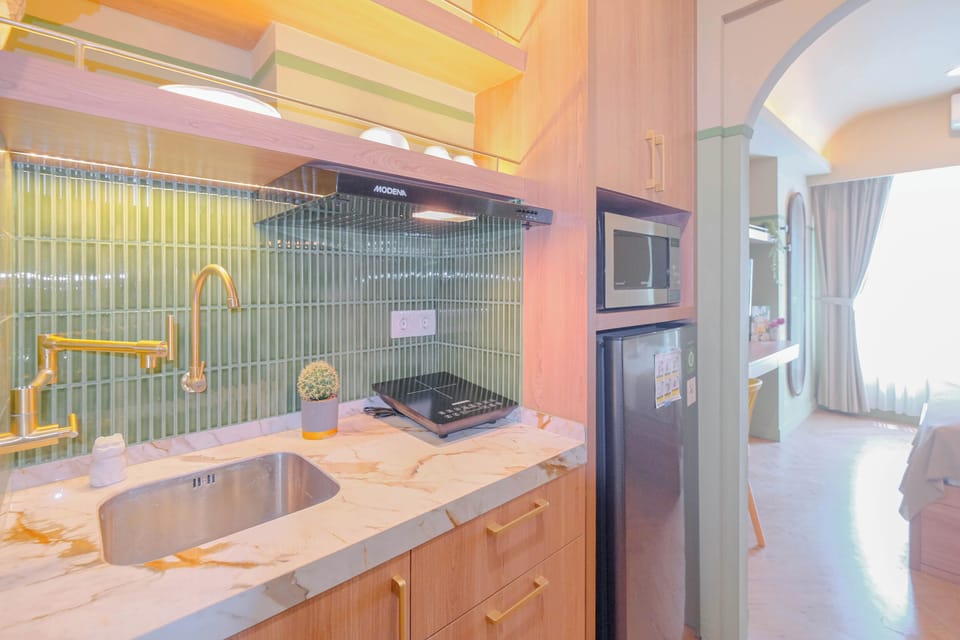 Apartment | Private kitchen | Fridge, stovetop, cookware/dishes/utensils