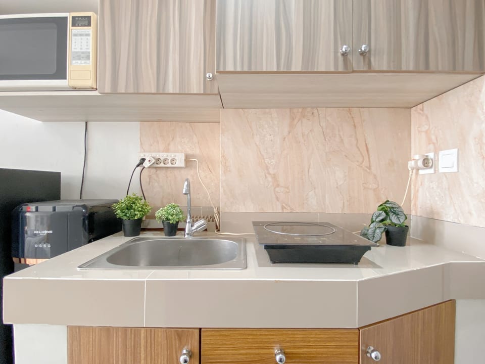 Apartment | Private kitchen | Fridge, stovetop, cookware/dishes/utensils