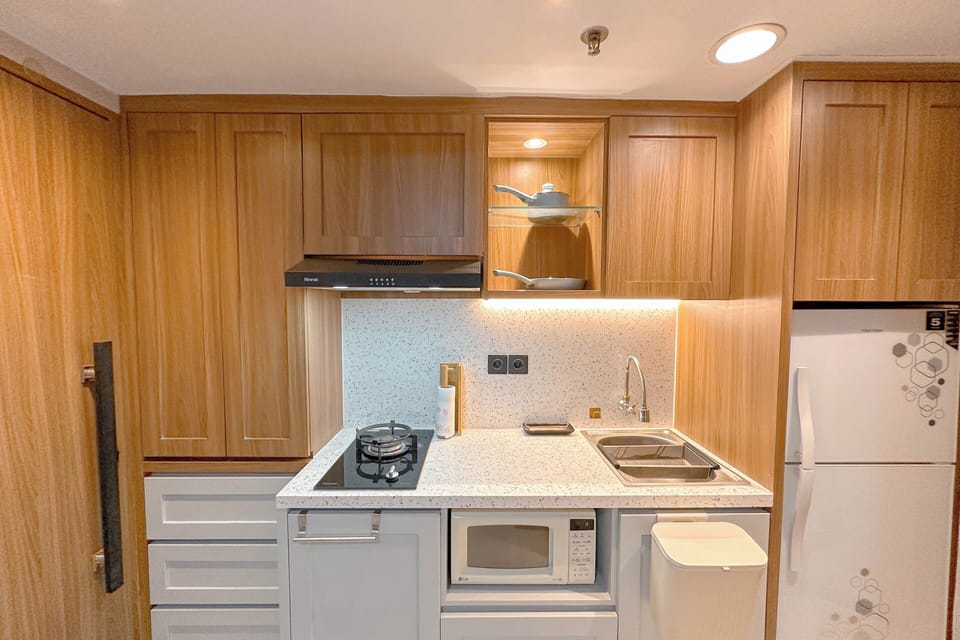 Apartment | Private kitchen | Fridge, stovetop, cookware/dishes/utensils
