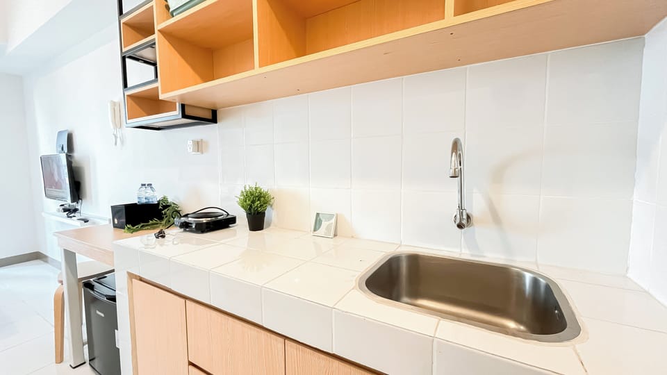 Apartment | Private kitchen | Fridge, stovetop, cookware/dishes/utensils