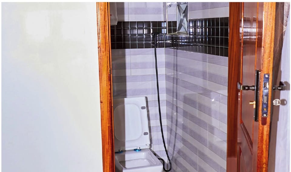 Comfort Single Room, City View | Bathroom | Shower, slippers, bidet, towels