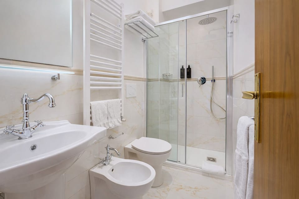 Shower, rainfall showerhead, eco-friendly toiletries, hair dryer