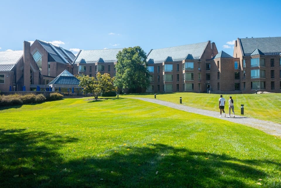 Stunning campus lined with lush grass.