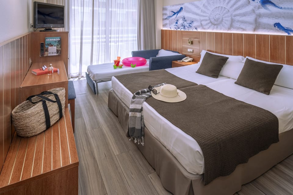 Minibar, desk, blackout drapes, iron/ironing board