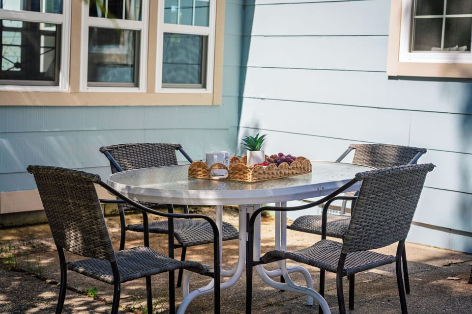 Shaded outdoor dining spot perfect for fresh-air meals, morning coffee, or a relaxed bite between lake-day adventures.