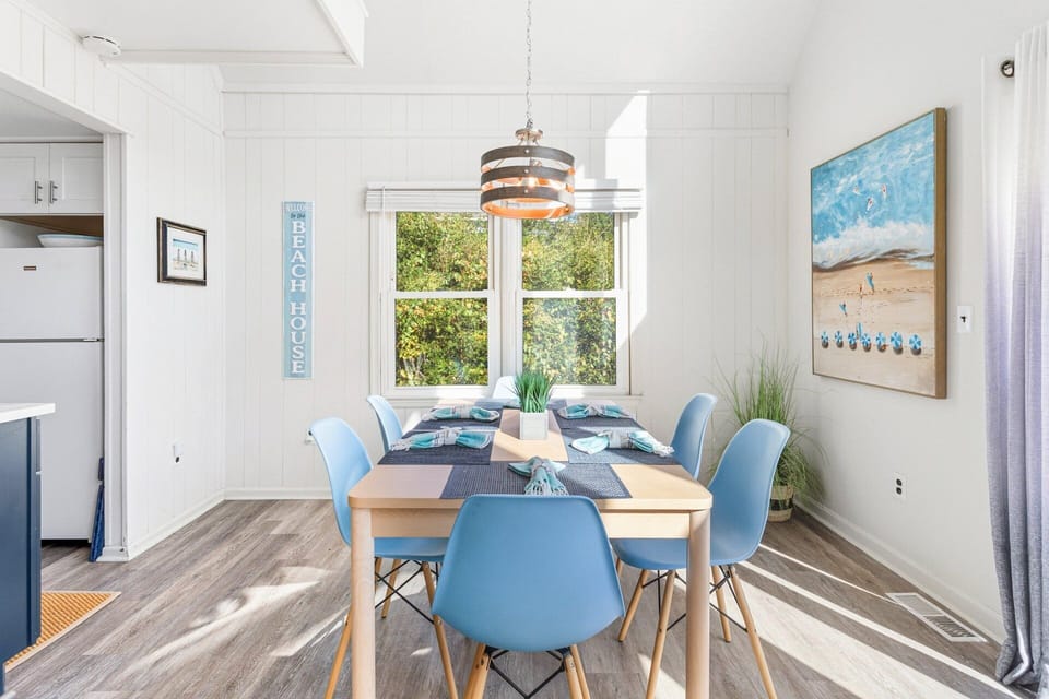 Share family meals or late-night laughs at the dining table, perfectly placed for easy access to both kitchen and living spaces.