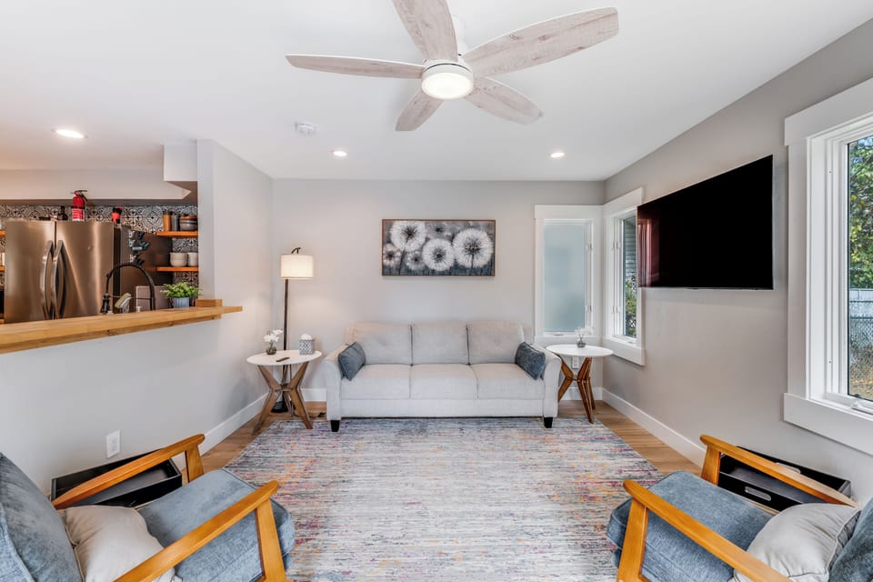 There is plenty of space in the living area to watch movies or pull out an extra bed with this sleeper sofa | Interior