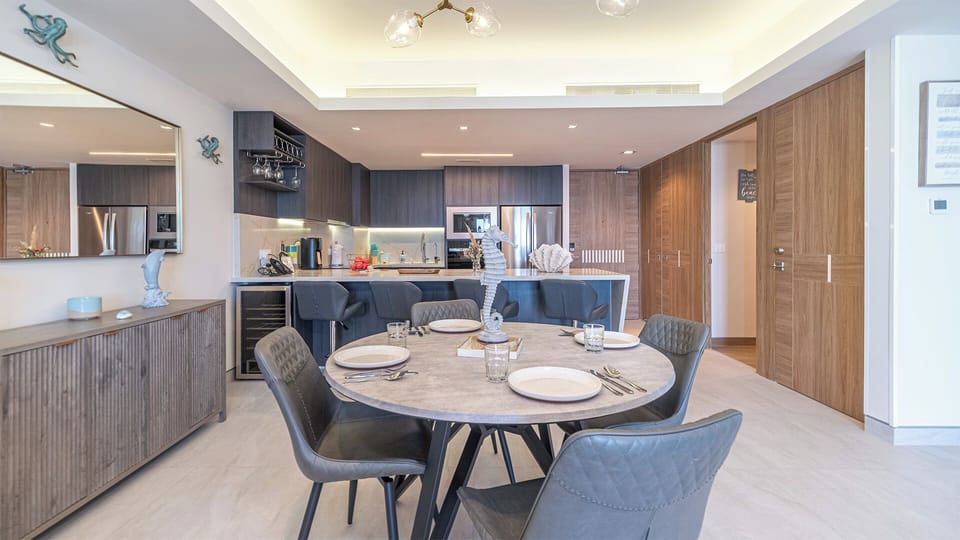 Dining table and kitchen in contemporary style