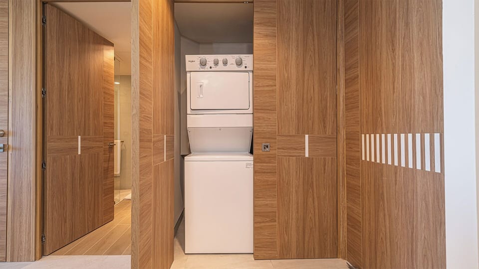THe washer and dryer are there in their own space.