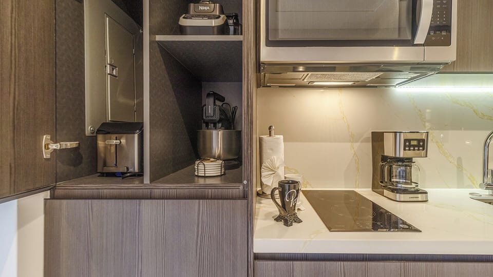 Small appliances in cabinet