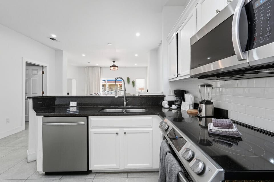 Bright kitchen view with open layout design