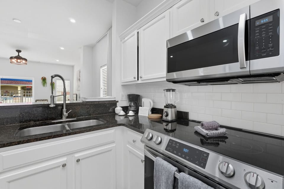 Modern kitchen with sleek black counters