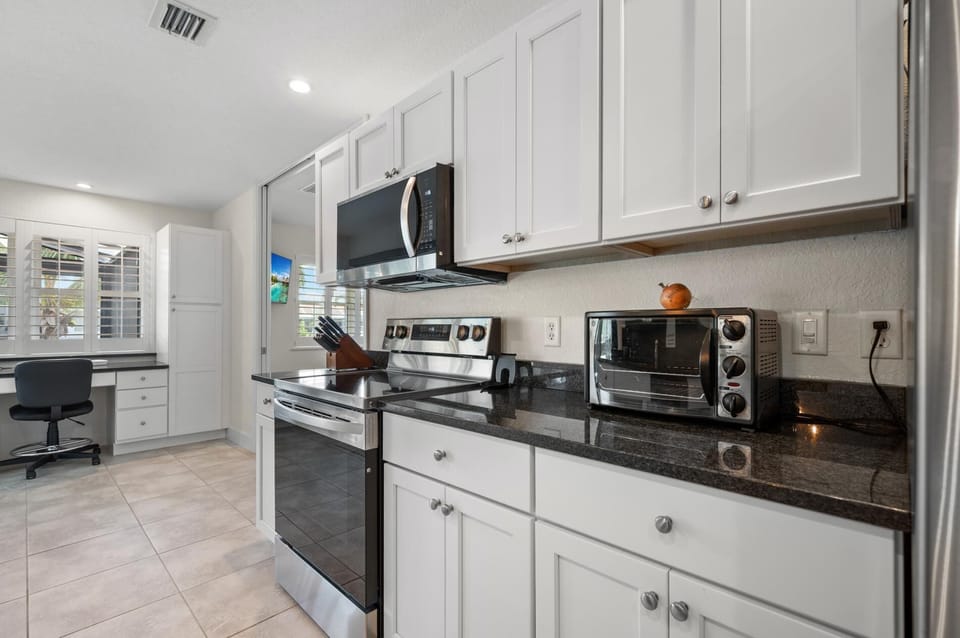 3BR Waterfront Home – Heated Saltwater Pool & Dock (4711)