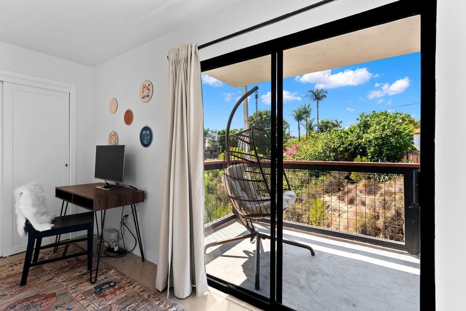 Workstation with natural light and serene outlook.