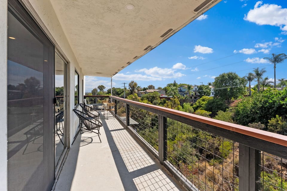 Chill on this shaded balcony on breezy days