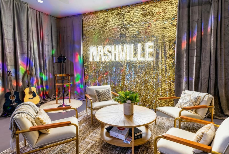 The game room's neon glow, guitars on the wall, and sequin accents turn a downstairs space into the heart of late-night fun, air hockey and music till dawn