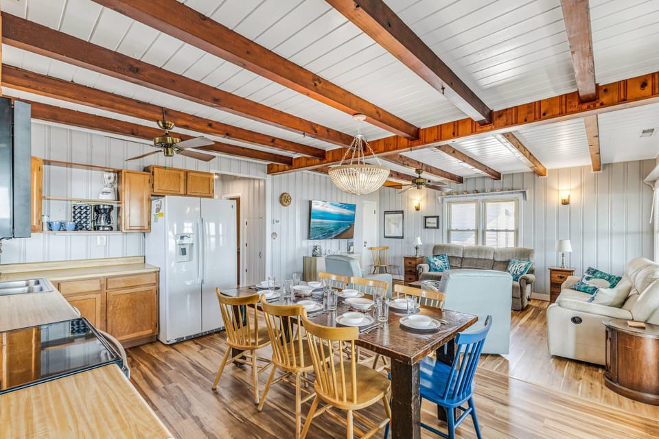 Open kitchen connected to the living room for comfortable shared space in the upper level.