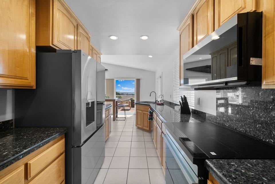 A kitchen with a view! Enjoy cooking while gazing out at the stunning scenery.