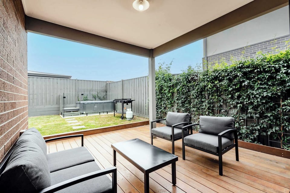 relax in the protected outdoor area with a 2 person spa available for guest use!