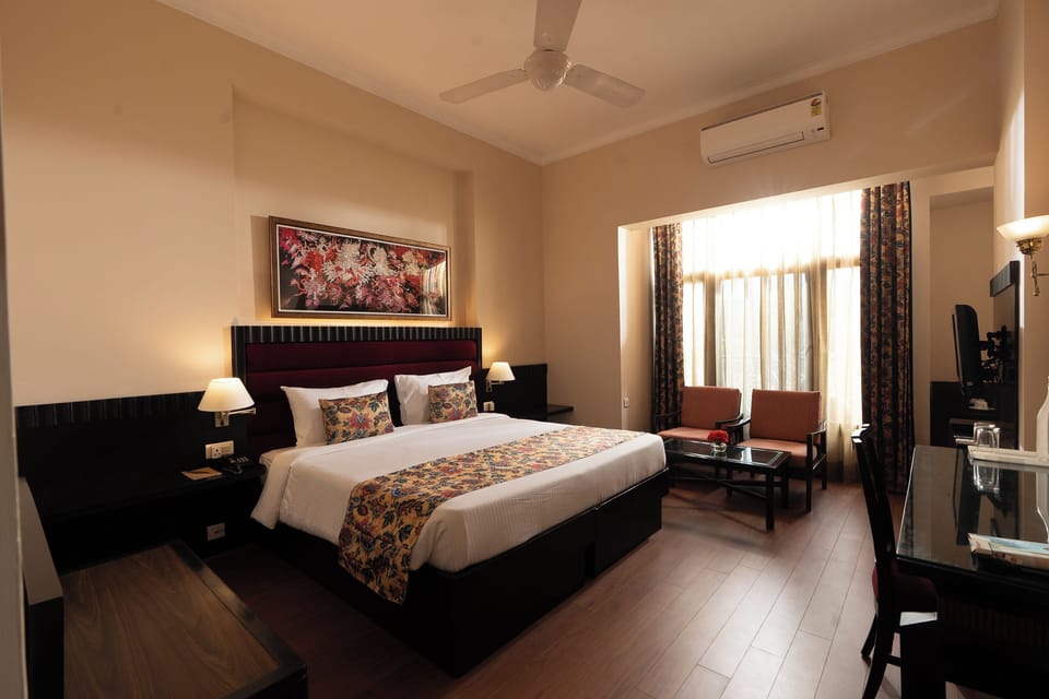Deluxe Double Room, City View | Iron/ironing board, free WiFi, bed sheets